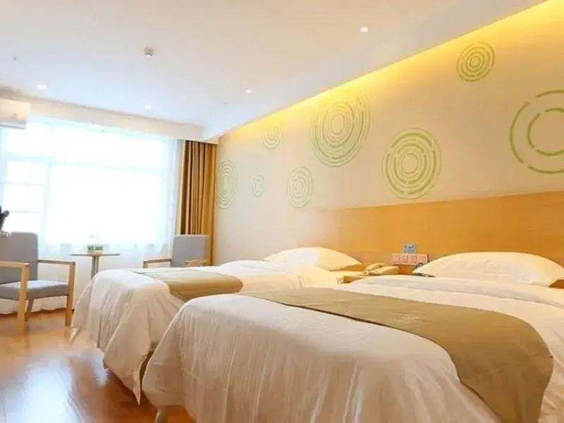 Bed in GreenTree Inn Taizhou Taixing City Xuanbao Town Zhongyang Road Express Hotel Bed in GreenTree Inn Taizhou Taixing City Xuanbao Town Zhongyang Road Express Hotel