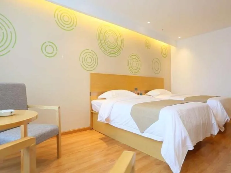 Bed in GreenTree Inn Taizhou Taixing City Xuanbao Town Zhongyang Road Express Hotel