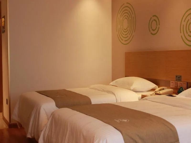 Bed in GreenTree Inn Taizhou Taixing City Xuanbao Town Zhongyang Road Express Hotel