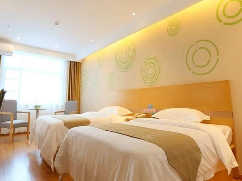 Bed in GreenTree Inn Taizhou Taixing City Xuanbao Town Zhongyang Road Express Hotel