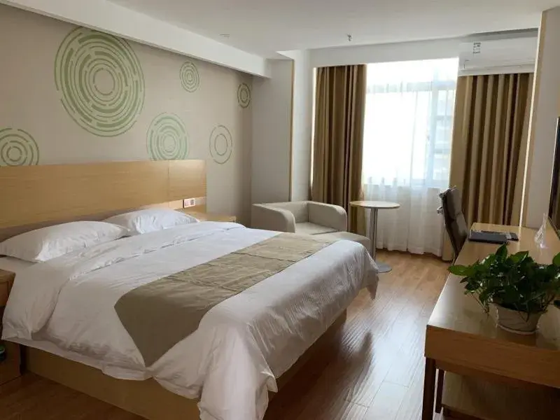 Bed in GreenTree Inn Taizhou Taixing City Xuanbao Town Zhongyang Road Express Hotel Bed in GreenTree Inn Taizhou Taixing City Xuanbao Town Zhongyang Road Express Hotel