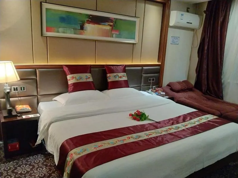 Bed in GreenTree Alliance Xinyang Pingqiao District Nanjing Road Dongyang Hotel