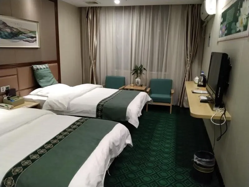 Bed in GreenTree Alliance Xinyang Pingqiao District Nanjing Road Dongyang Hotel