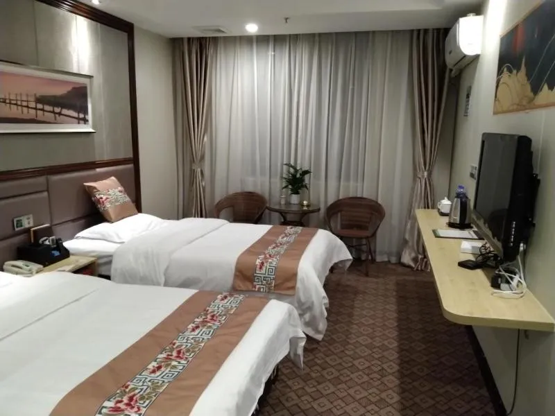 Bed in GreenTree Alliance Xinyang Pingqiao District Nanjing Road Dongyang Hotel