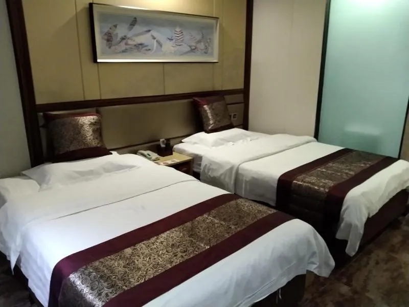Bed in GreenTree Alliance Xinyang Pingqiao District Nanjing Road Dongyang Hotel