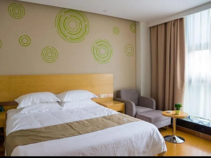 Bed in GreenTree Inn Nantong Qidong Binhai Industrial Park Nanhai RoadExpress Hotel
