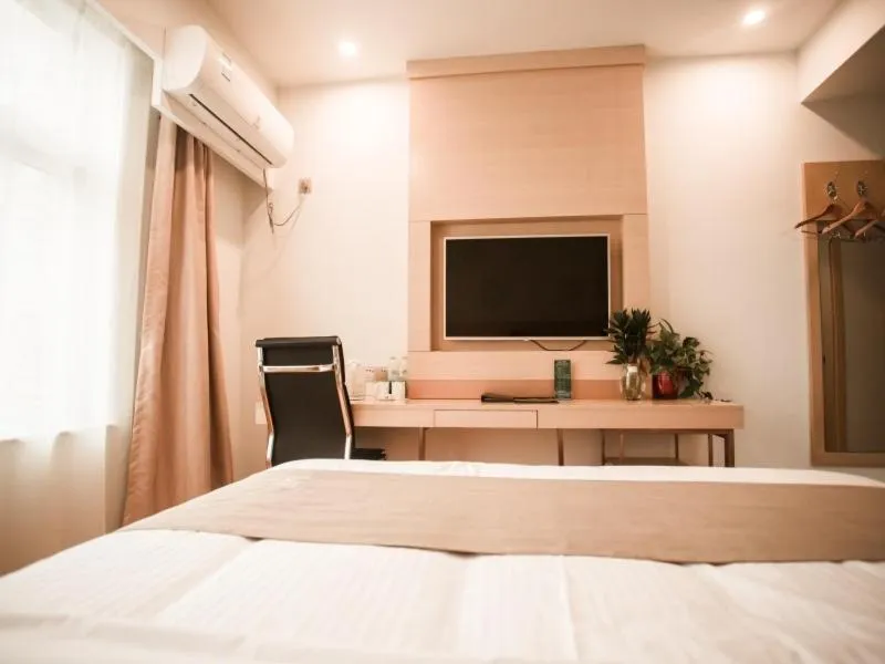 Bed in GreenTree Inn Heze Yucheng County Dongcheng International Business Hotel