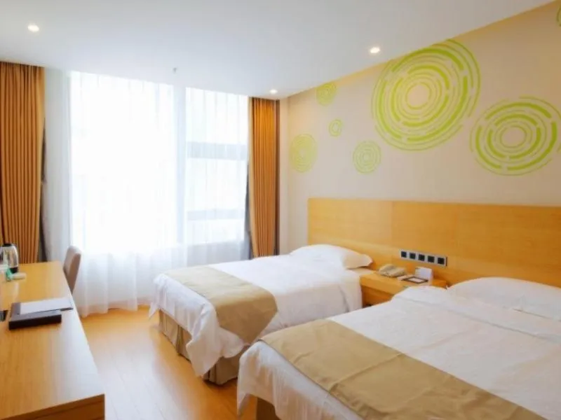 Bed in GreenTree Inn Heze Yucheng County Dongcheng International Business Hotel