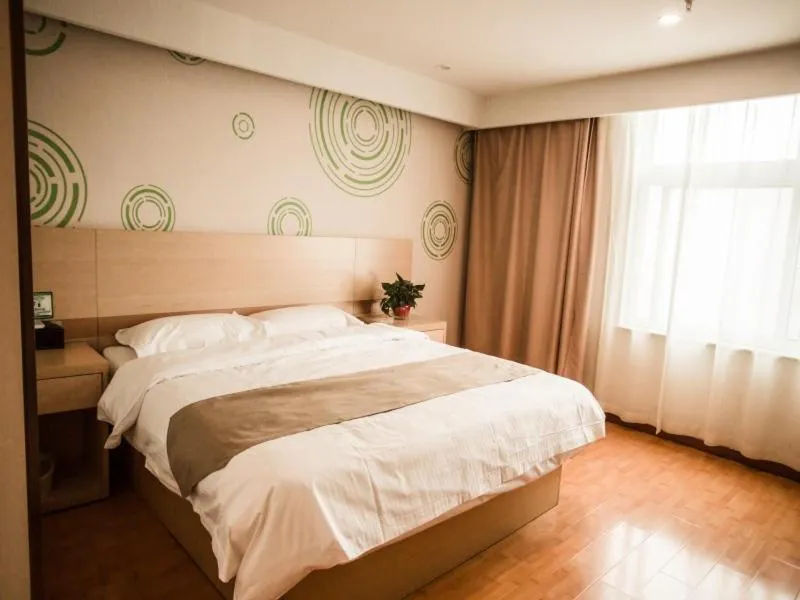 Bed in GreenTree Inn Heze Yucheng County Dongcheng International Business Hotel