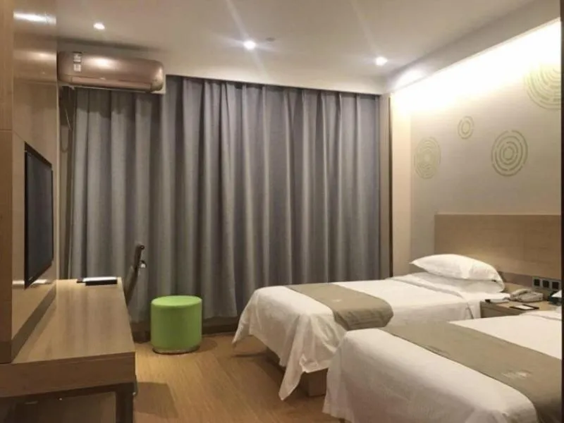 Bed in GreenTree Inn Jinzhong Xiyang County Bus Station Business Hotel