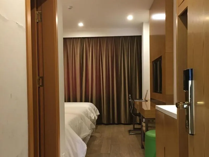 Bed in GreenTree Inn Jinzhong Xiyang County Bus Station Business Hotel