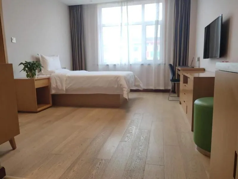 Bed in GreenTree Inn Jinzhong Xiyang County Bus Station Business Hotel