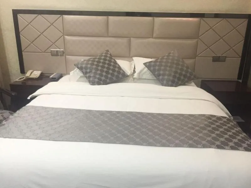 Bed in GreenTree Alliance Bengbu Railway Station Hotel