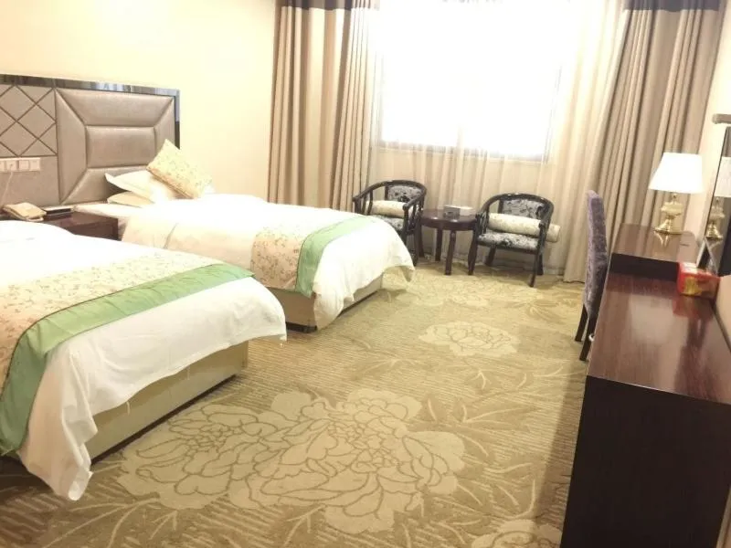 Bed in GreenTree Alliance Bengbu Railway Station Hotel