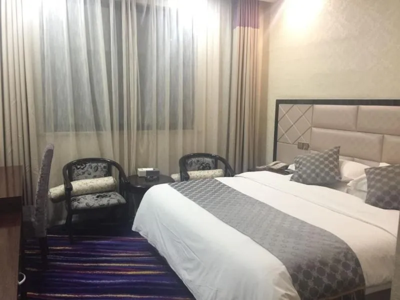 Bed in GreenTree Alliance Bengbu Railway Station Hotel