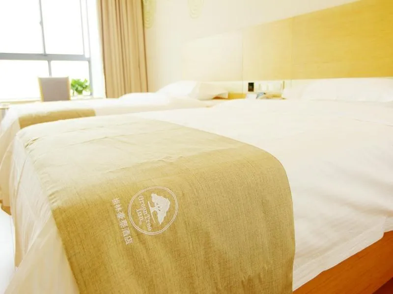 Bed in GreenTree Inn Wuxi Huishan District Yangshan Town Jiayang Life Plaza Business Hotel