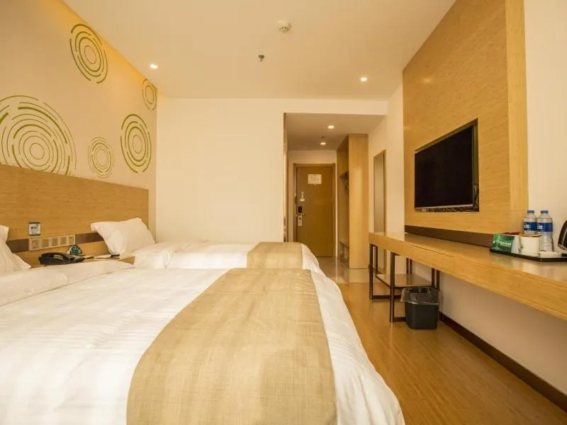 Bed in GreenTree Inn Handan Wei County Xianbiao Business Hotel