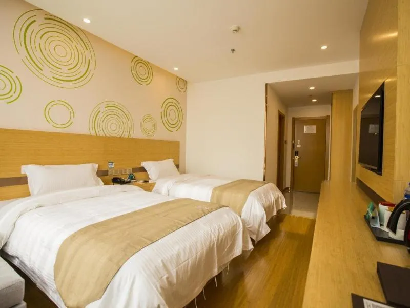 Bed in GreenTree Inn Handan Wei County Xianbiao Business Hotel