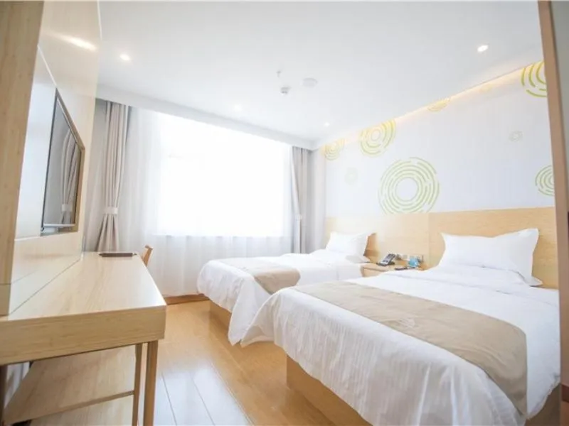 Bed in GreenTree Inn Langfang City Wen'an County Beach Town Anzu Road Business Hotel