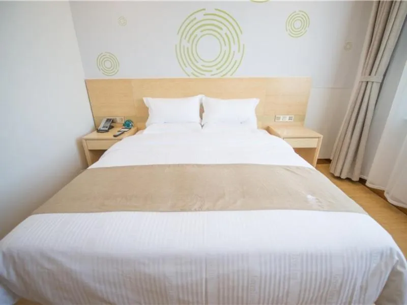 Bed in GreenTree Inn Langfang City Wen'an County Beach Town Anzu Road Business Hotel
