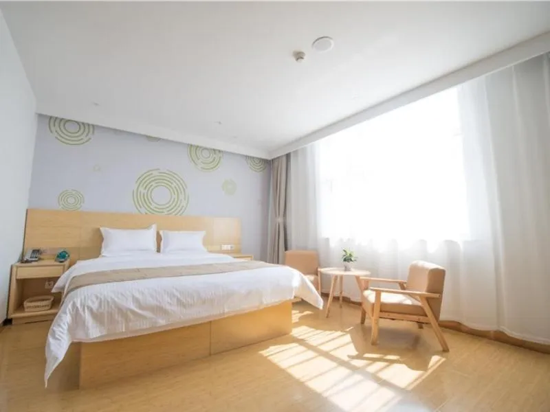 Bed in GreenTree Inn Langfang City Wen'an County Beach Town Anzu Road Business Hotel