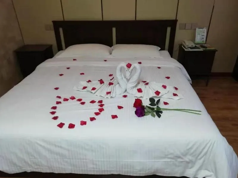 Bed in GreenTree Inn Jinan Licheng District Fenghuang Road High-speed Railway East Station Express Hotel