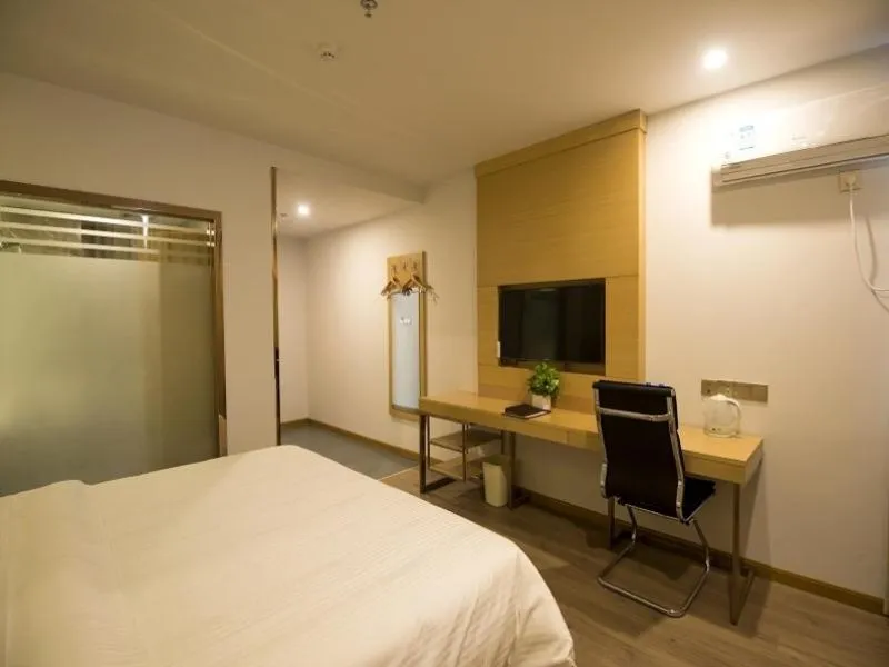 Bed in GreenTree Inn Zhenjiang Danyang City Danbei Town Xinqiao Business Hotel