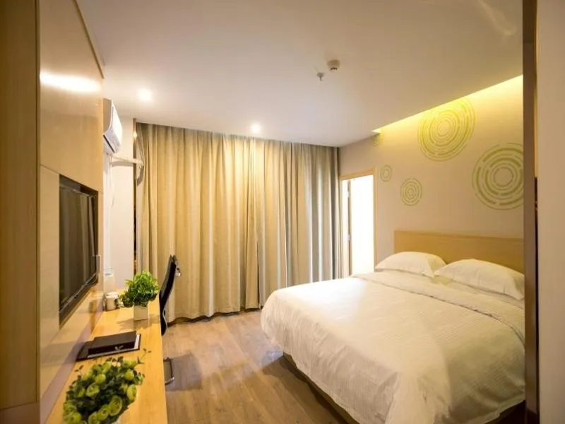 Bed in GreenTree Inn Zhenjiang Danyang City Danbei Town Xinqiao Business Hotel