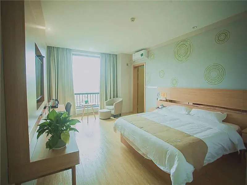 Bed in GreenTree Inn Zhoushan Baiquan Colorful Plaza Express Hotel Bed in GreenTree Inn Zhoushan Baiquan Colorful Plaza Express Hotel
