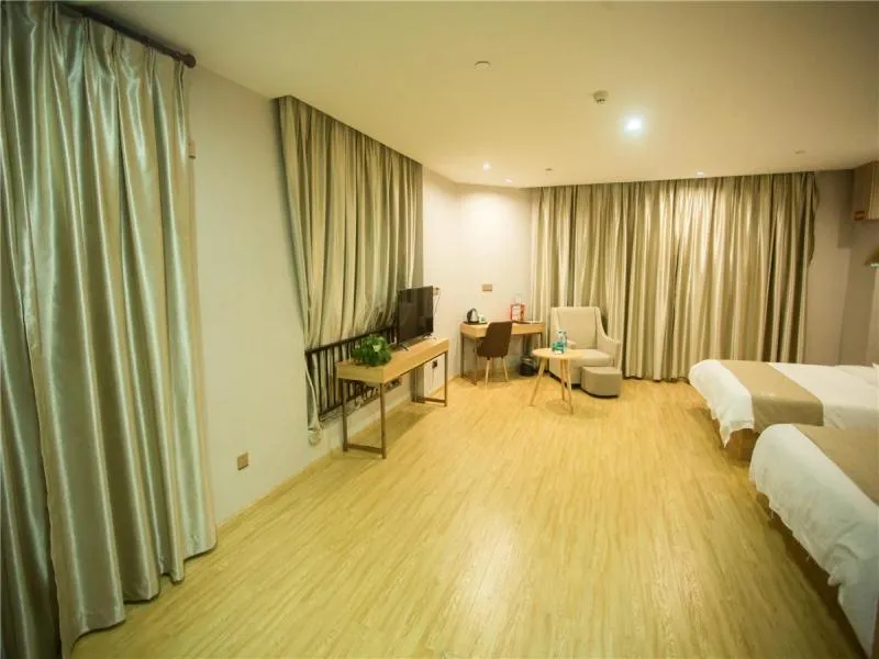 Bed in GreenTree Inn Zhoushan Baiquan Colorful Plaza Express Hotel