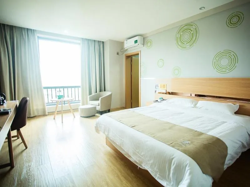 Bed in GreenTree Inn Zhoushan Baiquan Colorful Plaza Express Hotel