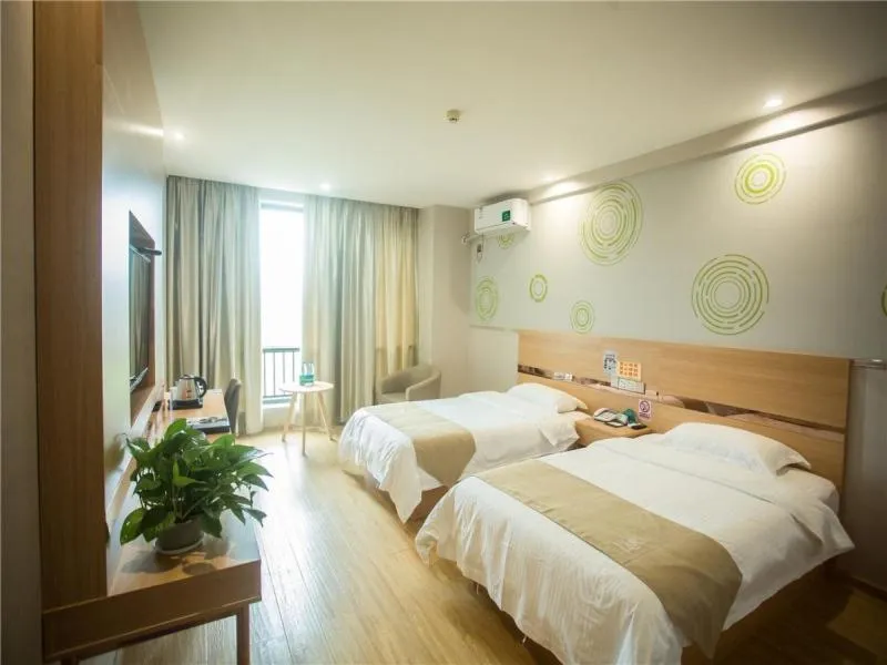 Bed in GreenTree Inn Zhoushan Baiquan Colorful Plaza Express Hotel