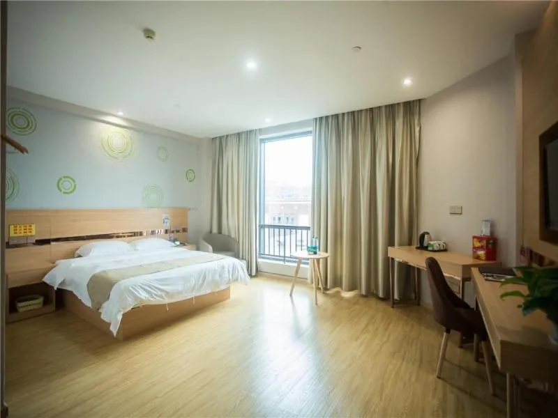 Bed in GreenTree Inn Zhoushan Baiquan Colorful Plaza Express Hotel