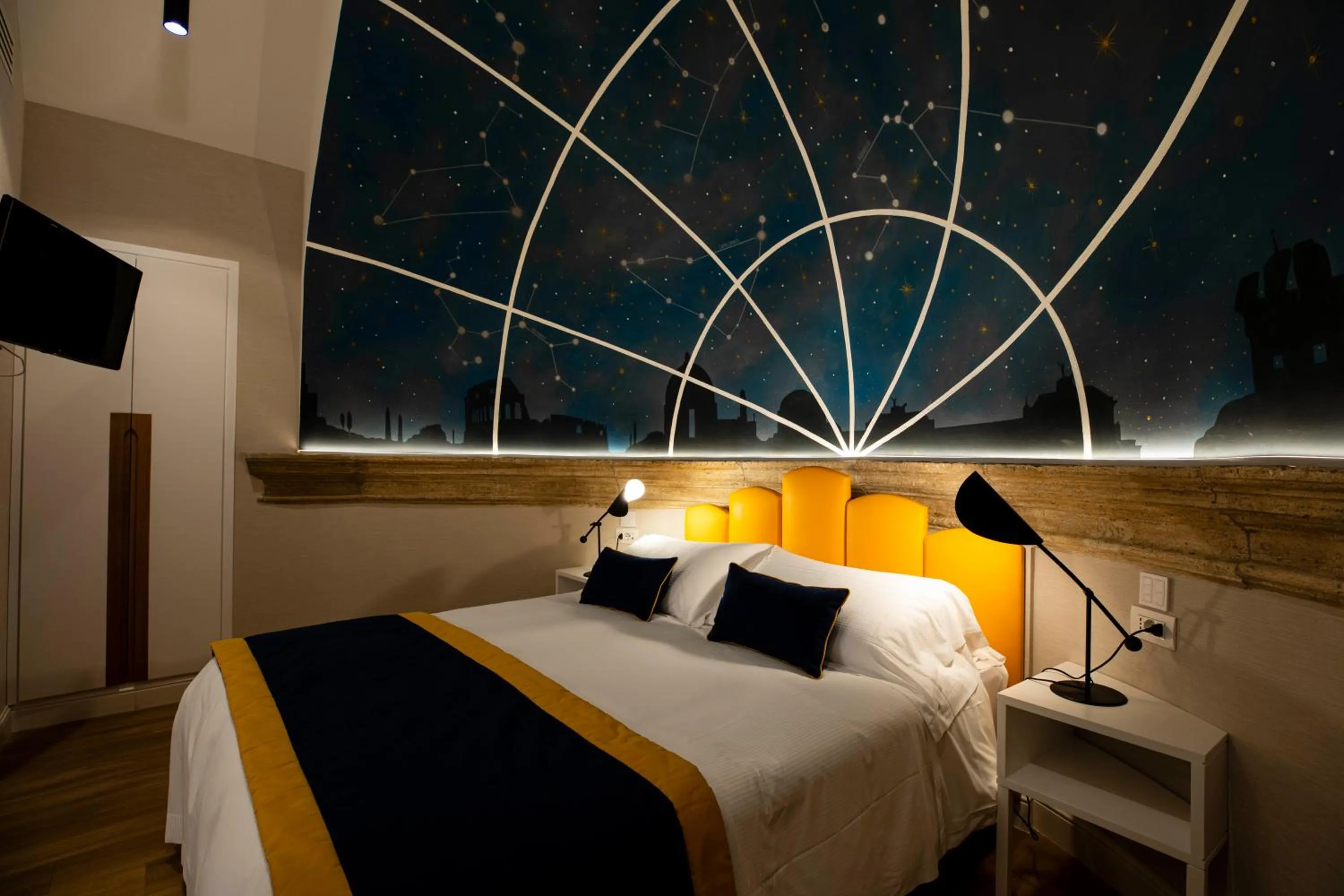 Bed in Vicario Suites