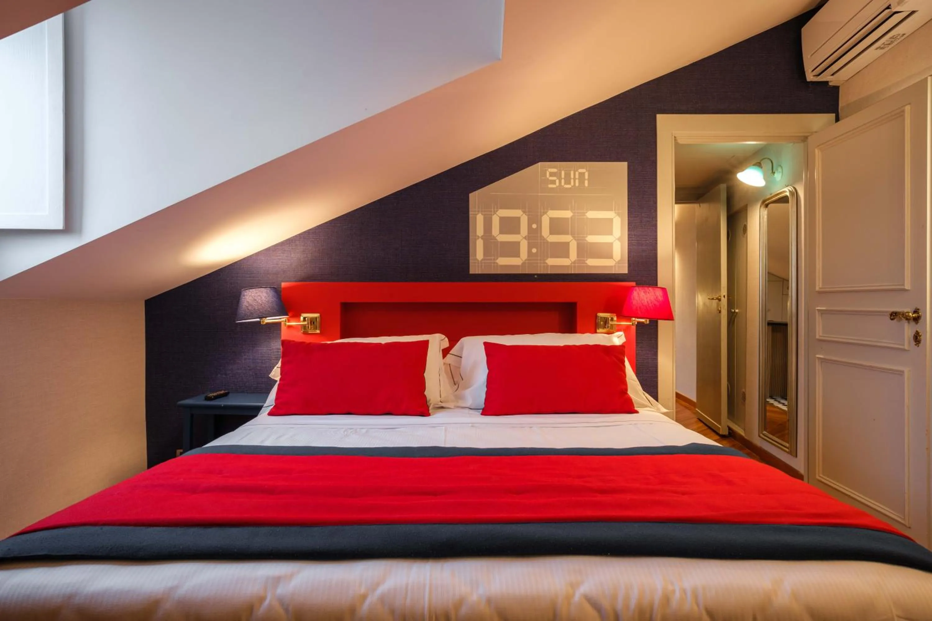 Bed in Vicario Suites