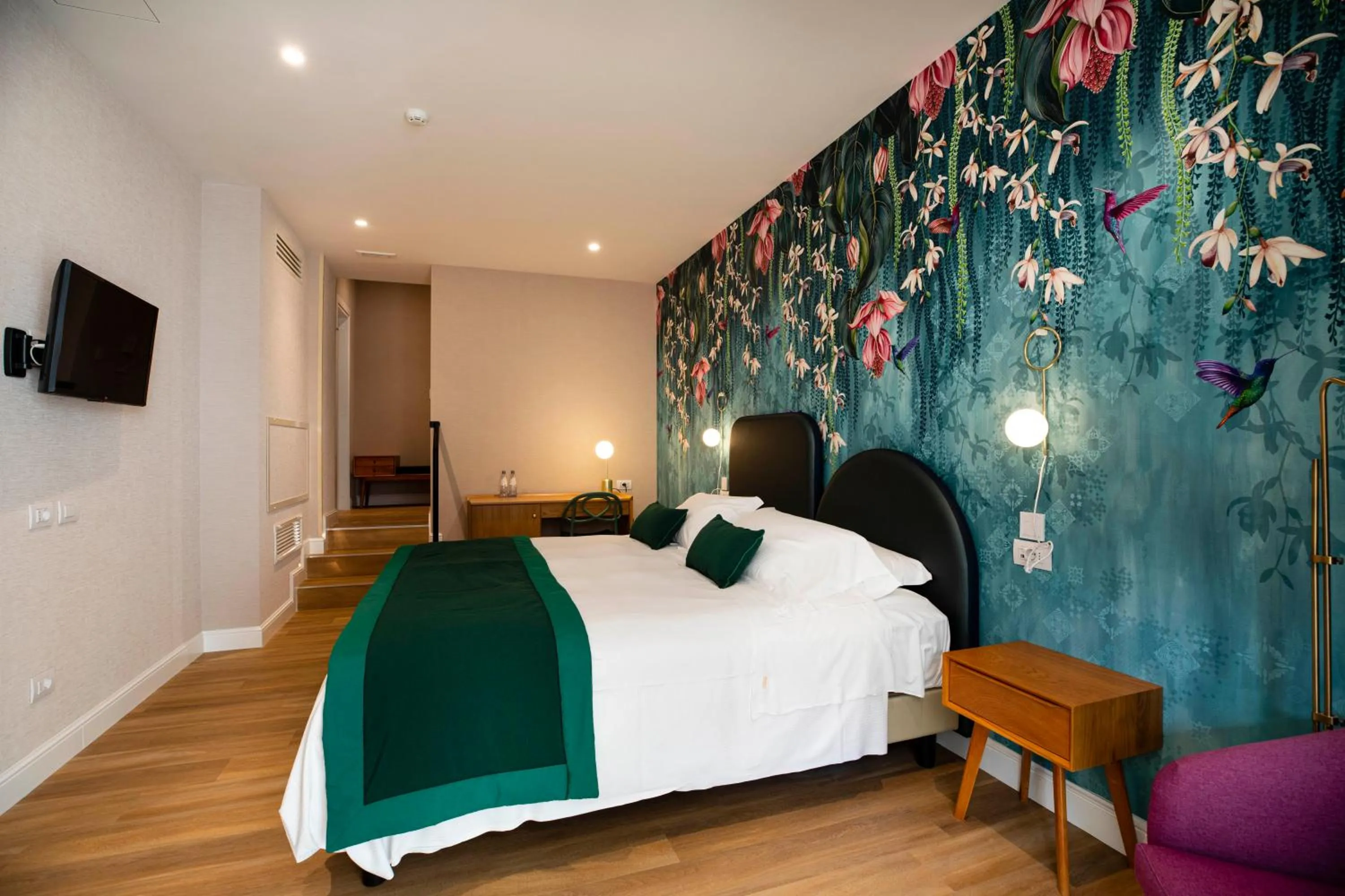 Bed in Vicario Suites