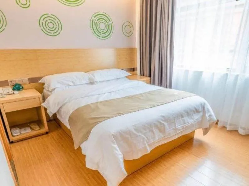 Bed in GreenTree Inn Lanzhou Yuzhong County Business Hotel