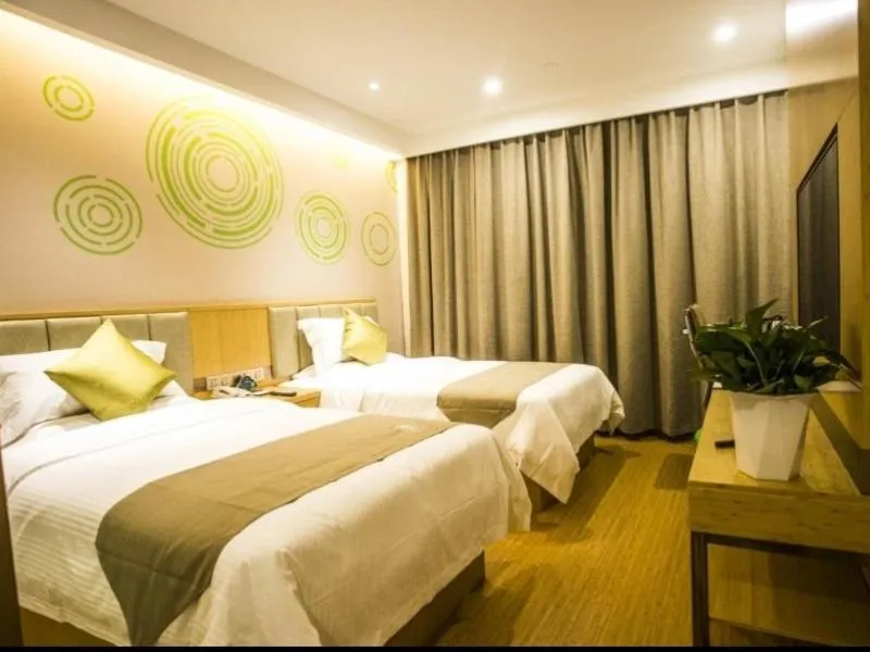 Bed in GreenTree Inn Xingtai Julu County Fengqing Road Business Hotel