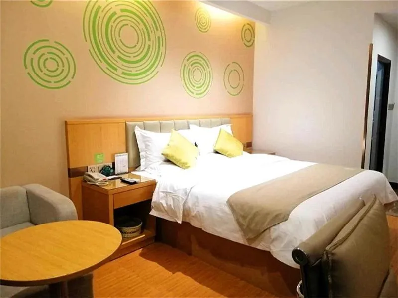 Bed in GreenTree Inn Xingtai Julu County Fengqing Road Business Hotel