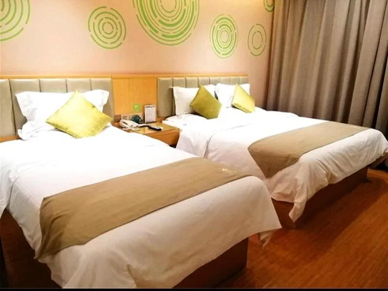 Bed in GreenTree Inn Xingtai Julu County Fengqing Road Business Hotel