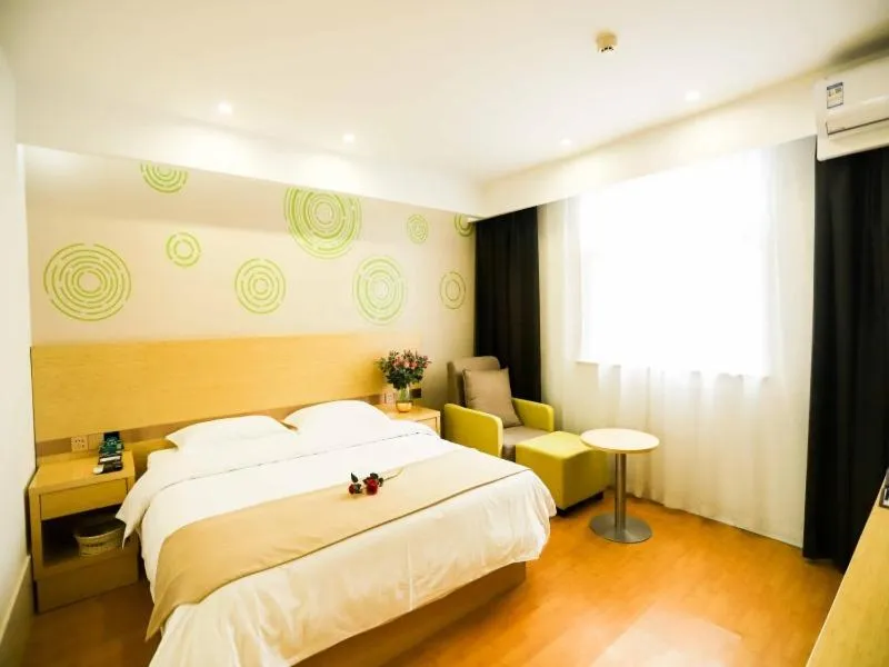 Bed in GreenTree Inn Xuzhou Economic Development Zone Da Miaozhen Business Hotel