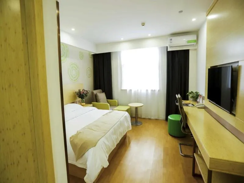 Bed in GreenTree Inn Xuzhou Economic Development Zone Da Miaozhen Business Hotel