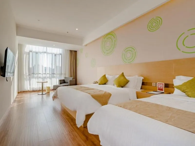 Bed in GreenTree Inn Taian High-speed Railway Station Lingshan Avenue Business Hotel