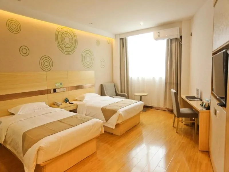 Bed in GreenTree Inn Anqing Huaining County Development Zone Duxiu Road Business Hotel