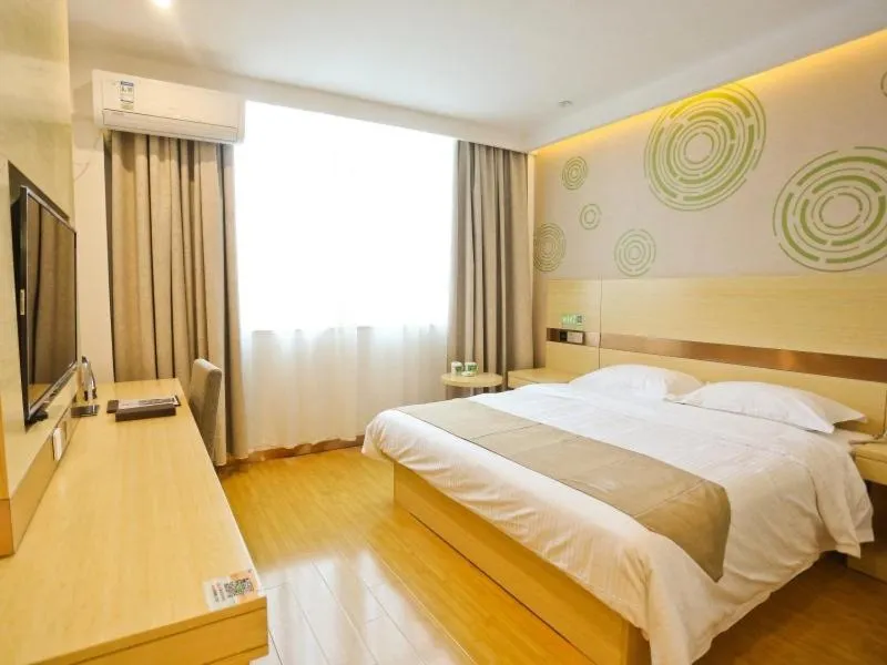 Bed in GreenTree Inn Anqing Huaining County Development Zone Duxiu Road Business Hotel