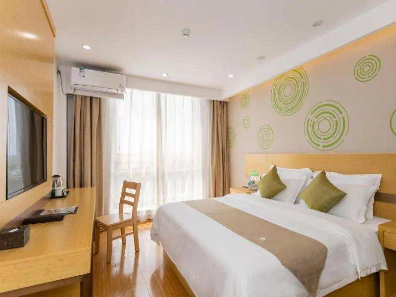 Bed in GreenTree Inn Jining Qufu High Speed Railway Station Express Hotel