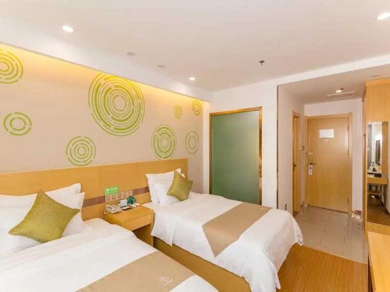 Bed in GreenTree Inn Jining Qufu High Speed Railway Station Express Hotel