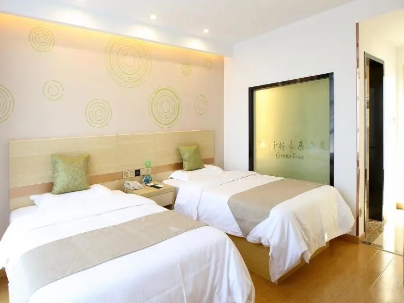 Bed in GreenTree Inn Wuxi Jiangyin City Ligang Town Chenshu Road Express Hotel