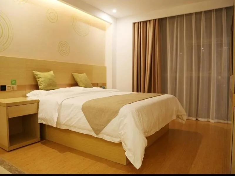 Bed in GreenTree Inn Wuxi Jiangyin City Ligang Town Chenshu Road Express Hotel
