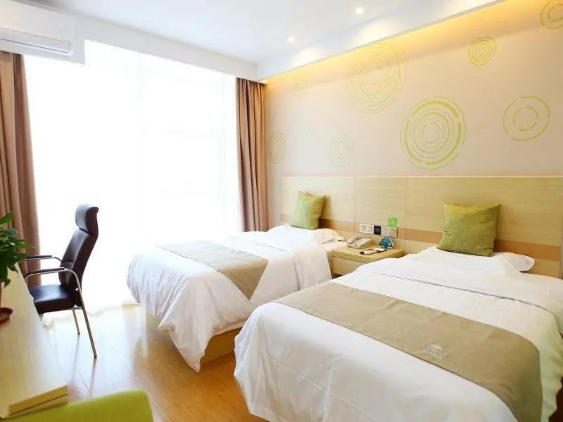 Bed in GreenTree Inn Wuxi Jiangyin City Ligang Town Chenshu Road Express Hotel